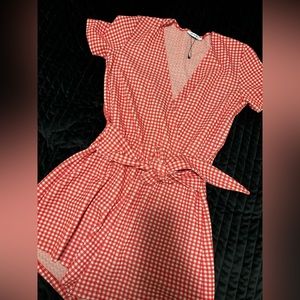 Patterned red and white romper with waist belt